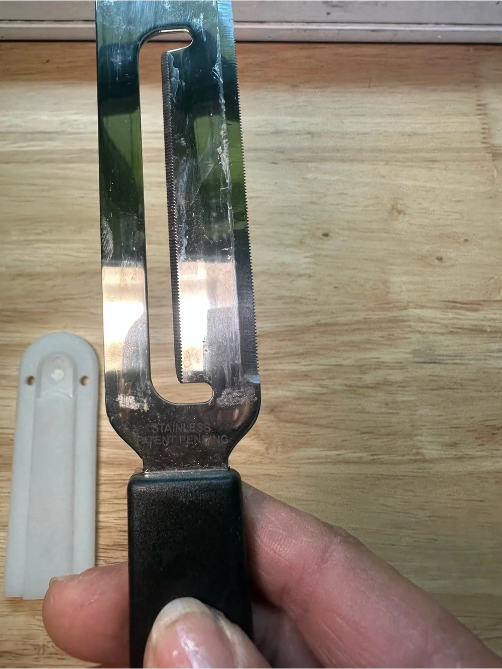 The Pampered Chef Cheese Plane with Black Handle and White Sheath #1125